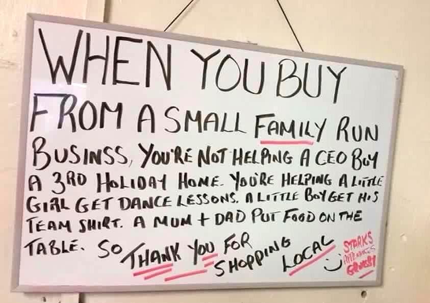 Old pic of a whiteboard in a small shop